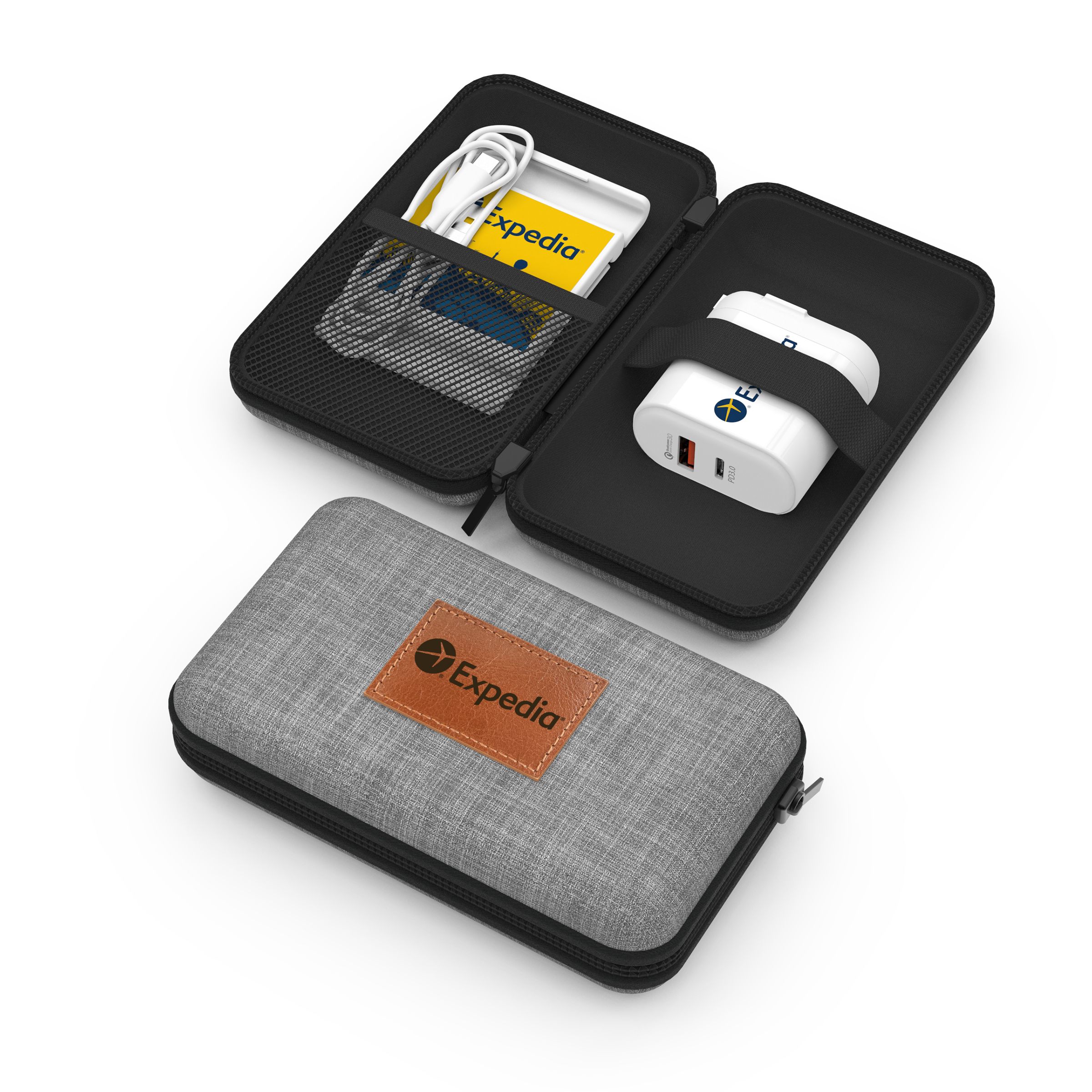 black container opened with a charger and charging cables. next to a closed case in gray with a brown label with "expedia"